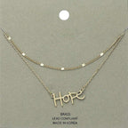 Gold layered Hope pendant necklace by Madeline Love in the Hope Monroe Closet