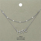 Rhodium layered Hope pendant necklace by Madeline Love in the Hope Monroe Closet