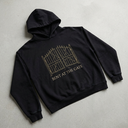 Bent at the Gate oversized hoodie - cracked iron gate line art in Antique Gold on Void Black